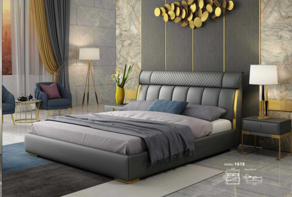 Modern grijs leren slaapkamer met gouden roestvrijstalen accenten.