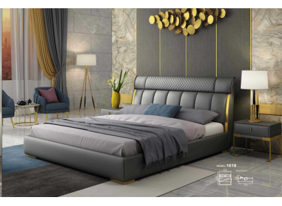 Modern grijs leren slaapkamer met gouden roestvrijstalen accenten.