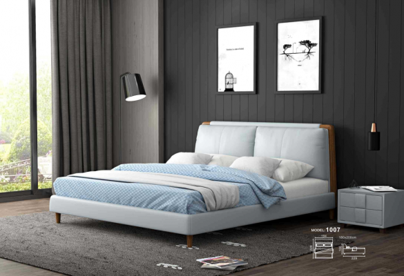 Moderne tweepersoonsbed van 180x200 in wit lederen design op houten poten.