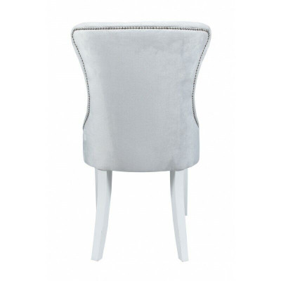 Grijze gestoffeerde Chesterfieldstoel ontworpen door Einitzer fauteuils voor de eetkamer.