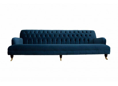 Luxe designbank in Chesterfield-stijl met vier zitplaatsen in de kleur blauw.