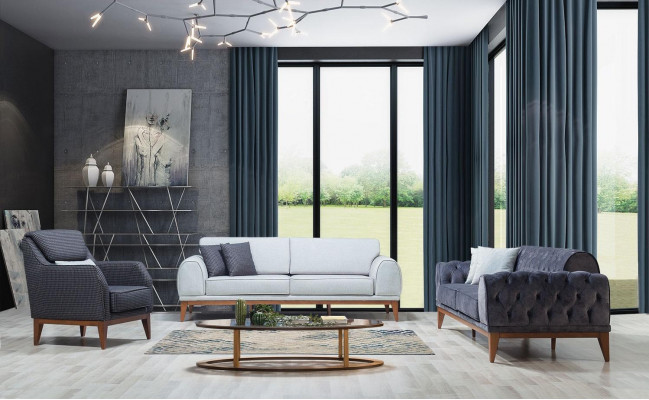 Grijze gestoffeerde éénzitter fauteuil met armleuningen, ontwerpersstoel.