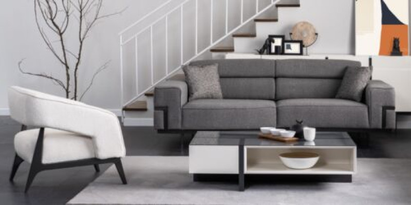 Grijswitte zitgroep woonkamer 3-zits fauteuil houten salontafel