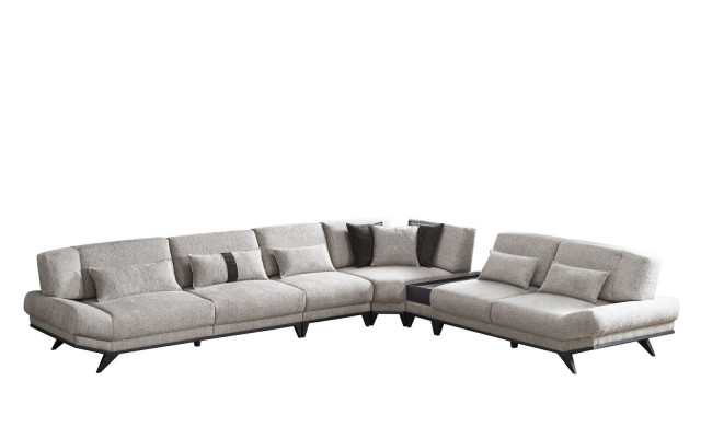 Grijze woonkamer bank L-vormige zithoek hoekbank gestoffeerde bank nieuw