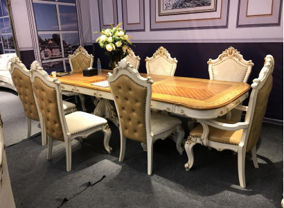 Wit-bruine eetkamerset Grote eettafel met leren stoelen