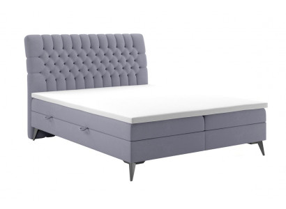 Chesterfield bed stoffering design luxe tweepersoonsbed slaapkamer boxspringbed