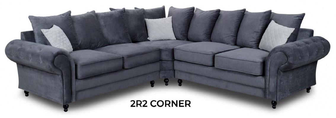 Moderne hoekbank in grijze stof, in L-vorm.