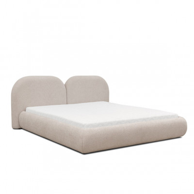 Beige slaapkamer met tweepersoonsbed en rond textiel hoofdeinde, nieuw.