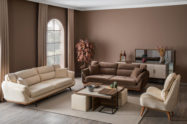 Beige bank gestoffeerde bank meubels banken woonkamer driezits textiel stof