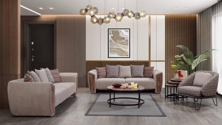 Beige woonkamer gestoffeerde bankstel driezitsbank fauteuil textiel meubels