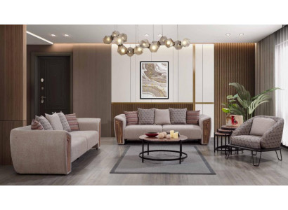 Beige woonkamer gestoffeerde bankstel driezitsbank fauteuil textiel meubels