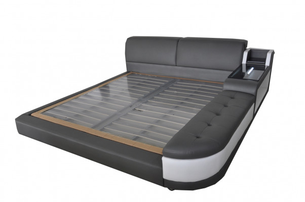 Ontwerper gestoffeerd bed voor slaapkamer gemaakt van hoogwaardige materialen.