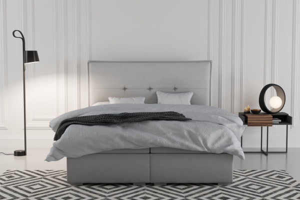 Boxspring bed hotel dubbel textiel grijs luxe bedden gestoffeerde bedlade functie.