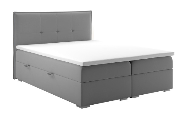 Boxspring bed hotel dubbel textiel grijs luxe bedden gestoffeerde bedlade functie.