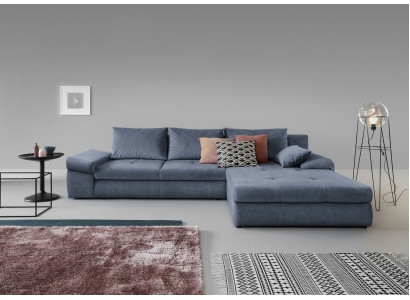 L-vormige zithoek in grijze stoffering voor de woonkamer.