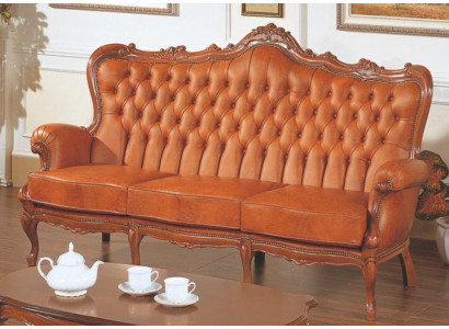 Luxe 3-zitsbank van bruin leer in art-decostijl.