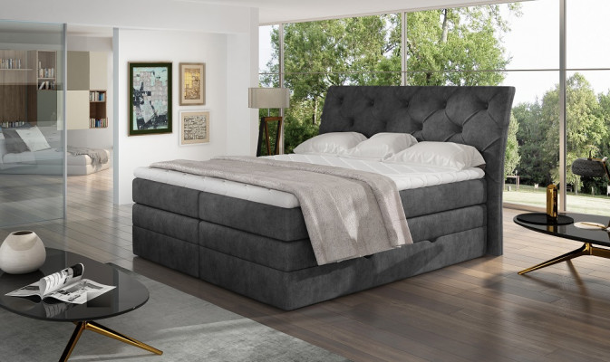 Luxe slaapkamer bed gestoffeerd Chesterfield boxspring luxe tweepersoons hotel