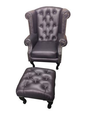 Luxe oorfauteuil en hocker Chesterfield fauteuil zwart leer modern