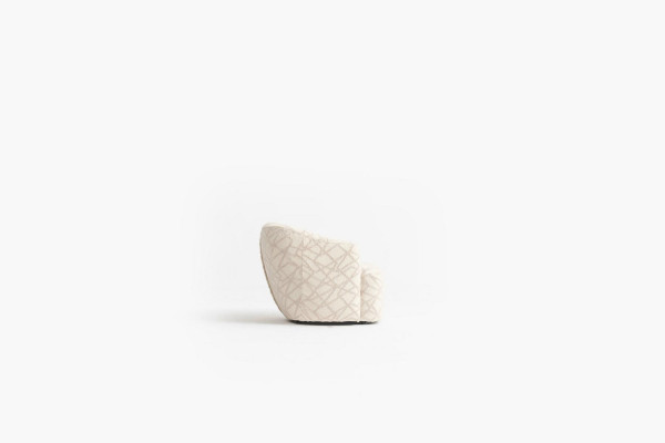 Gevoerde cocktail fauteuil in een aangename kleur in een modern ontwerp