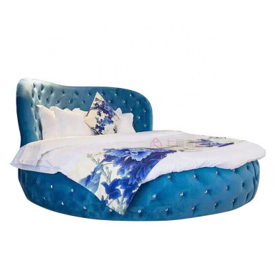 Rond designbed van Chesterfield-stijl voor de slaapkamer, gestoffeerd met paars textiel en leer, luxueus.