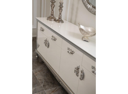 Witte ladekast met handige laden en elegante planken.