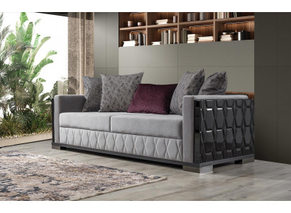 Luxe bankstel van drie zitsbanken in grijs stoffen design voor de woonkamer.