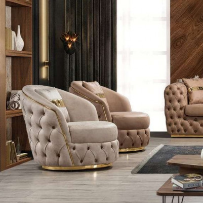 Een luxueuze, moderne fauteuil in een lichte beige tint van Chesterfield