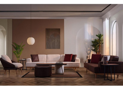 Stijlvolle bruin-witte bankstel woonkamer fauteuil salontafel poef