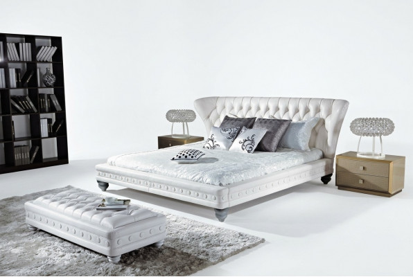 Ontwerper tweepersoonsbed bed bedden leer Chesterfield hotel luxe slaapkamer