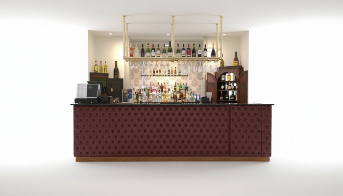 Maatwerk panelen bar wandbekleding gestoffeerde kussens.