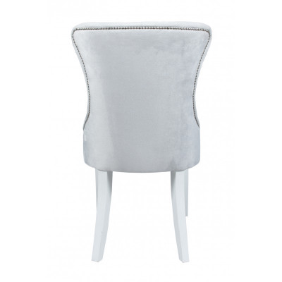 Grijze gestoffeerde Chesterfieldstoel ontworpen door Einitzer fauteuils voor de eetkamer.