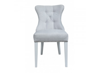 Grijze gestoffeerde Chesterfieldstoel ontworpen door Einitzer fauteuils voor de eetkamer.