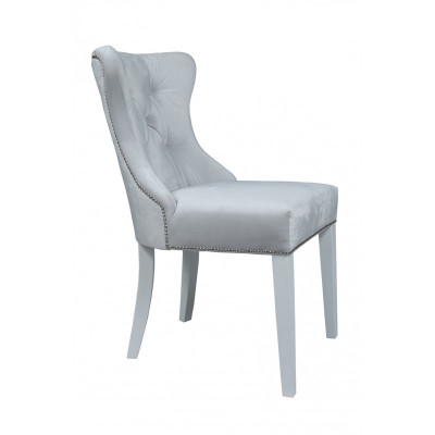 Grijze Chesterfield zithoek Moderne eetkamerstoelen Luxe zits.