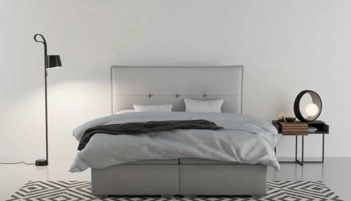 Boxspring bed hotel dubbel textiel grijs luxe bedden gestoffeerde bedlade functie.