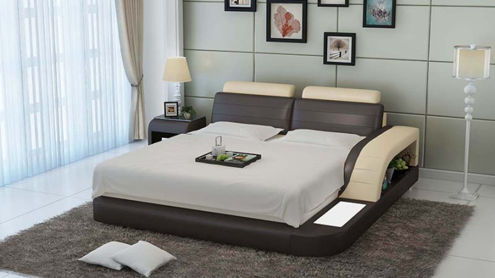 Modern slaapkamerbed met hoogwaardig design, beddengoed, en multifunctionele USB-aansluiting.