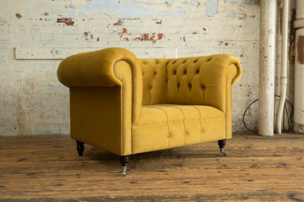 Chesterfield design bank fauteuil sofa bekleding luxe textiel banken oorfauteuil.