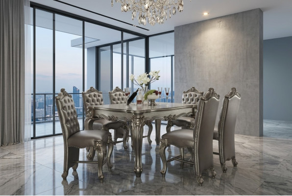 Grijze klassieke rechthoekige eettafel met 8 Chesterfield houten leren stoelen.