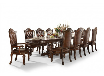 Luxe barokstijl eetkamerset met designer eettafel en bruine Chesterfield stoelen.