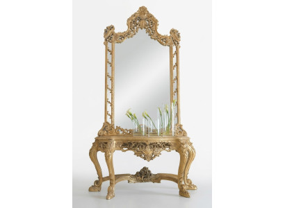 Luxe gesneden console tafel en spiegel in een elegante omlijsting.