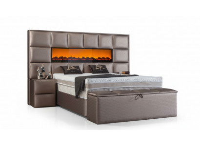 Elegante eigentijdse tweepersoonsbed met ruim gestoffeerd hoofdeinde.