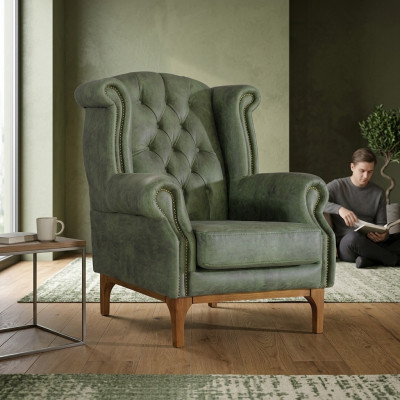 Groene Chesterfield luxe fauteuil gestoffeerde designer fauteuil met armleuningen.