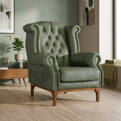 Groene Chesterfield luxe fauteuil gestoffeerde designer fauteuil met armleuningen.