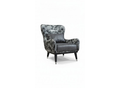 Woonkamer fauteuil met gestoffeerde zitting in modern design met slangenprint bekleding.