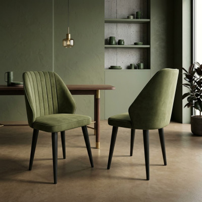 Groene stoel op zwarte houten poten voor de eetkamer, nieuw comfortabel model.
