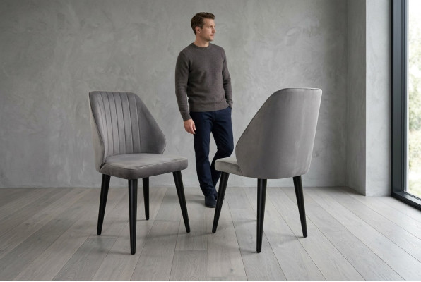 Grijze eetkamerstoel luxe éénpersoons textielmeubels ontwerper model nieuw.
