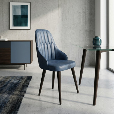 Originele eetkruk in de kleur blauw met een zachte rug voor uw eetkamer.
