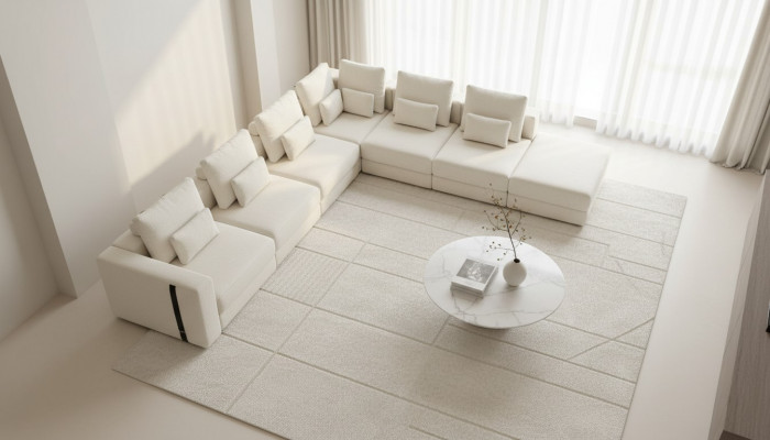 Witte woonlandschap woonkamer L-vorm bank stoffering designer meubelen stijl