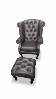Luxe oorfauteuil en hocker Chesterfield fauteuil zwart leer modern