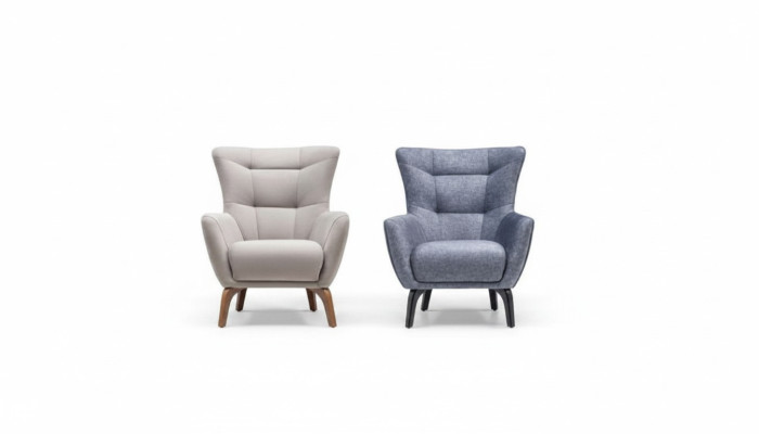 Woonkamer eenzit fauteuil oorfauteuil stoffen fauteuil grijs gestoffeerde zit.