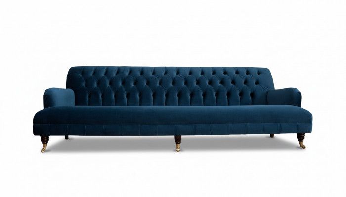 Luxe designbank in Chesterfield-stijl met vier zitplaatsen in de kleur blauw.